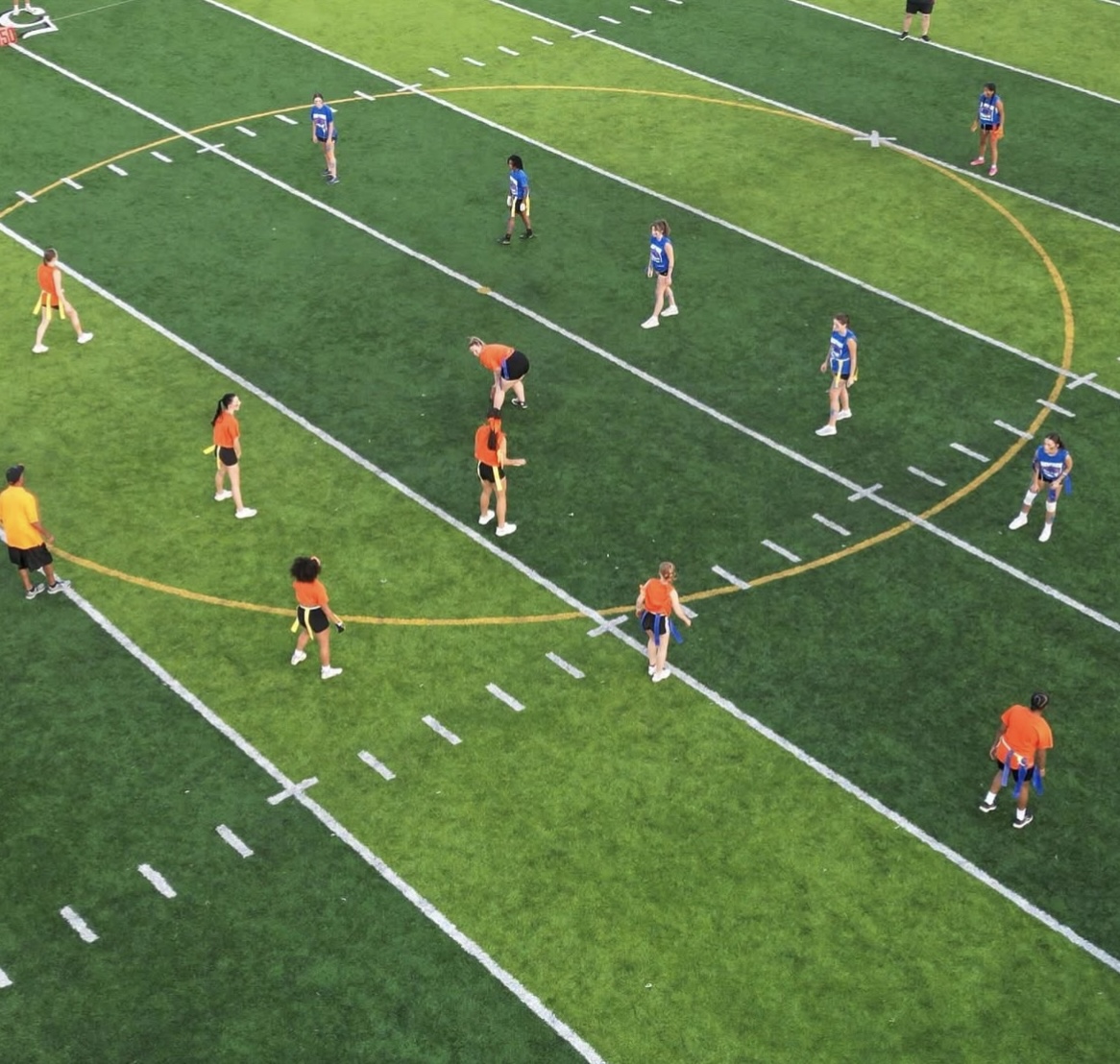 Juniors line up to kick off the ball while seniors are in kick return. Seniors went on offense as juniors went on defense. 