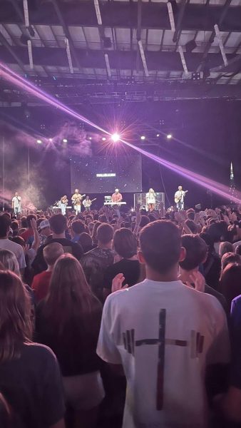 Jules Simmons, 12, attends O,NE. Thousands of students come together to worship in Liberty First Credit Union Arena. 