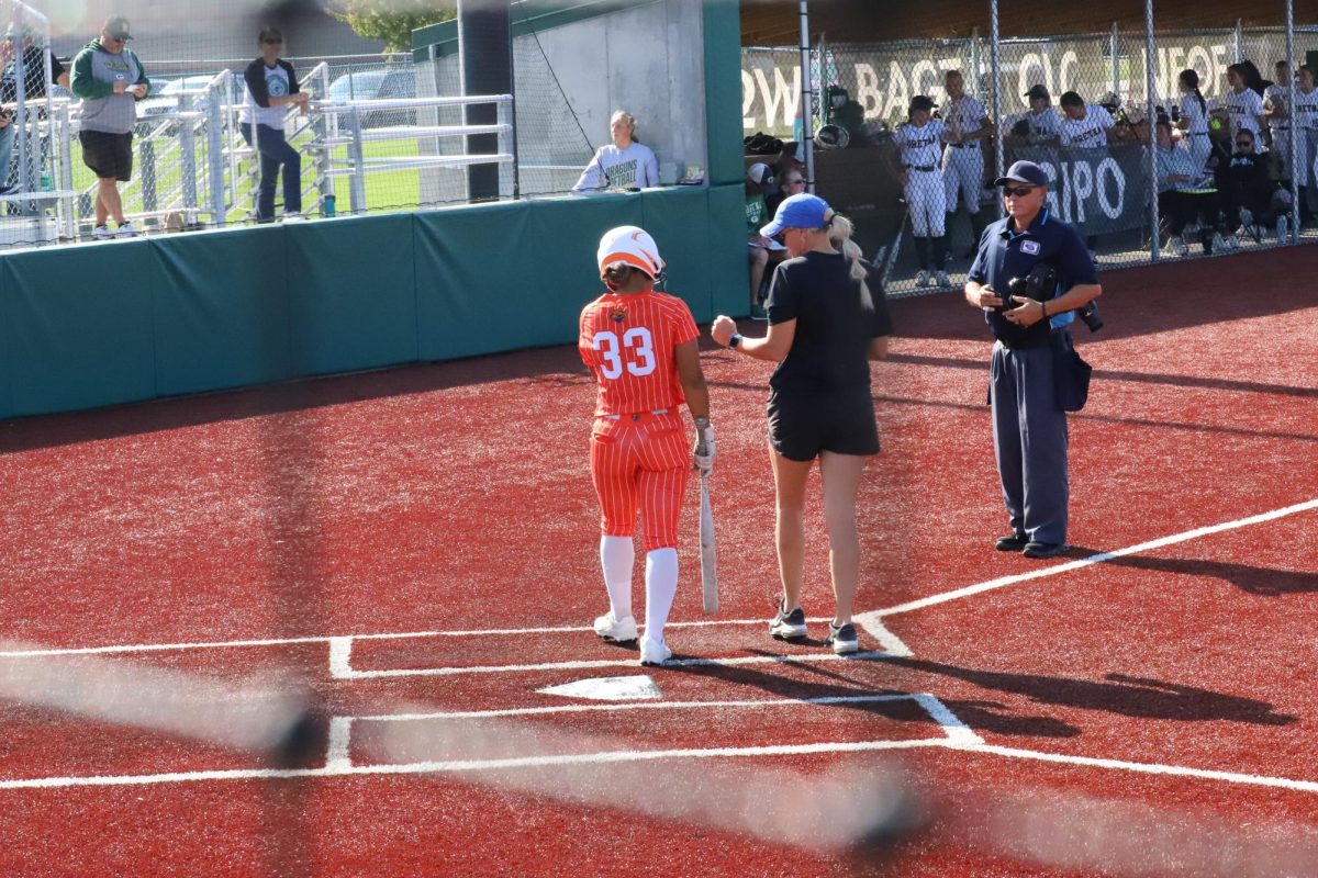 Naomi Tackitt, 11, steps up to bat.