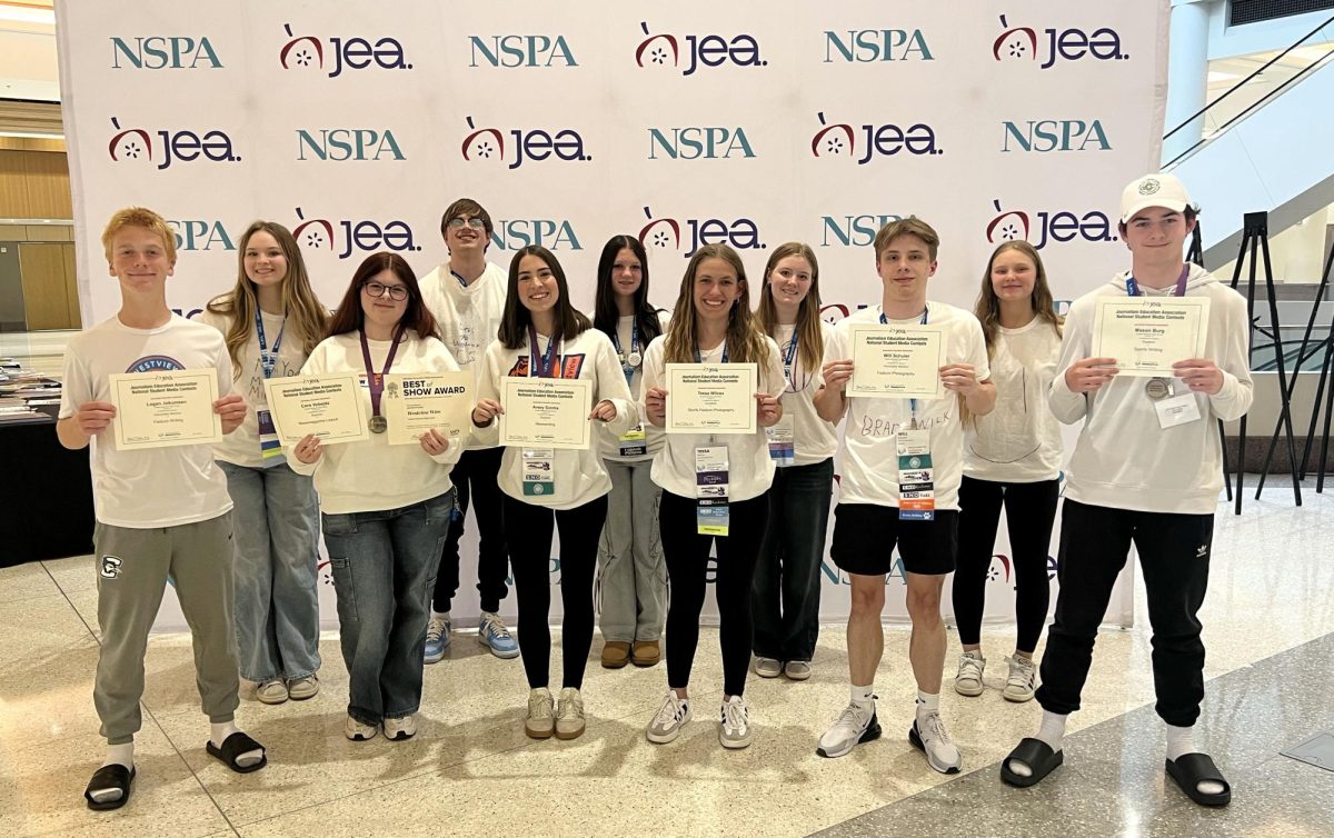 Journalism students celebrate their successful trip to the JEA/NSPA National Journalism Convention in Minneapolis April 18.