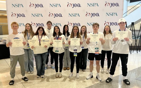 Journalism students celebrate their successful trip to the JEA/NSPA National Journalism Convention in Minneapolis April 18.